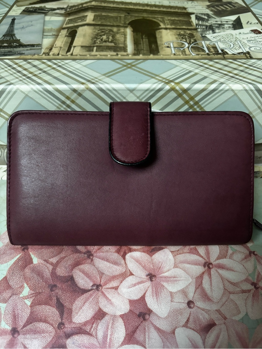 Buxton Model 39 Ensemble Clutch wallet in a burgundy/deep red top-grain cowhide